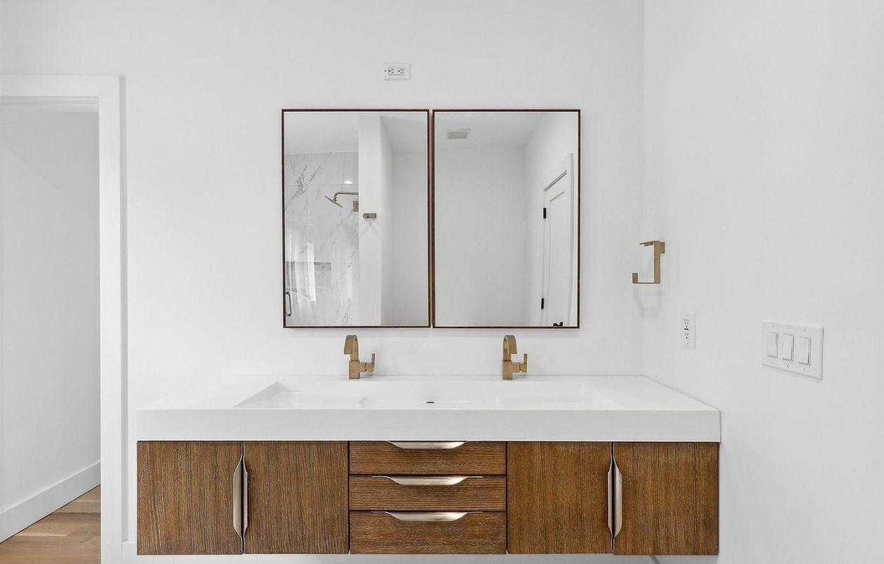 Bathroom, Dual Sink Vanities, Interior, Marble Walls, Wood Texture Flooring