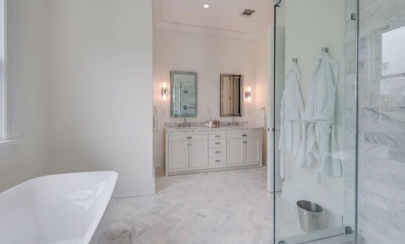 Bathroom, Dual Sink Vanities, Free Standing Baths, Glass Shower, Interior, Marble, Marble Walls, Recessed Lighting