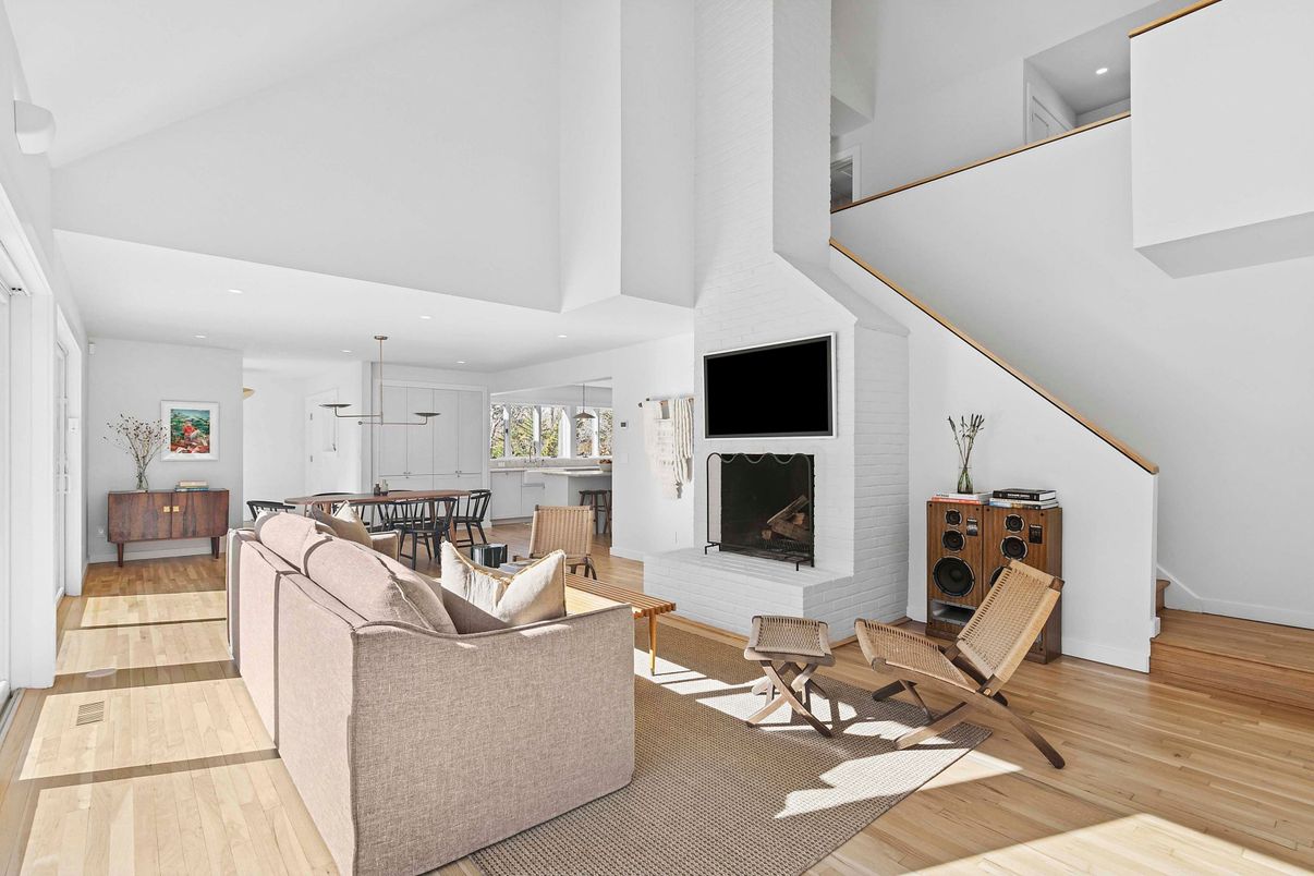 Dining room, Fireplace, Interior, Living room, Pendant Lights, Recessed Lighting, Wood Texture Flooring