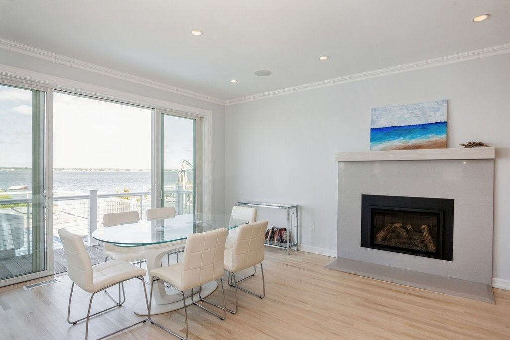 Dining room, Fireplace, Interior, Recessed Lighting, Water, Wood Texture Flooring