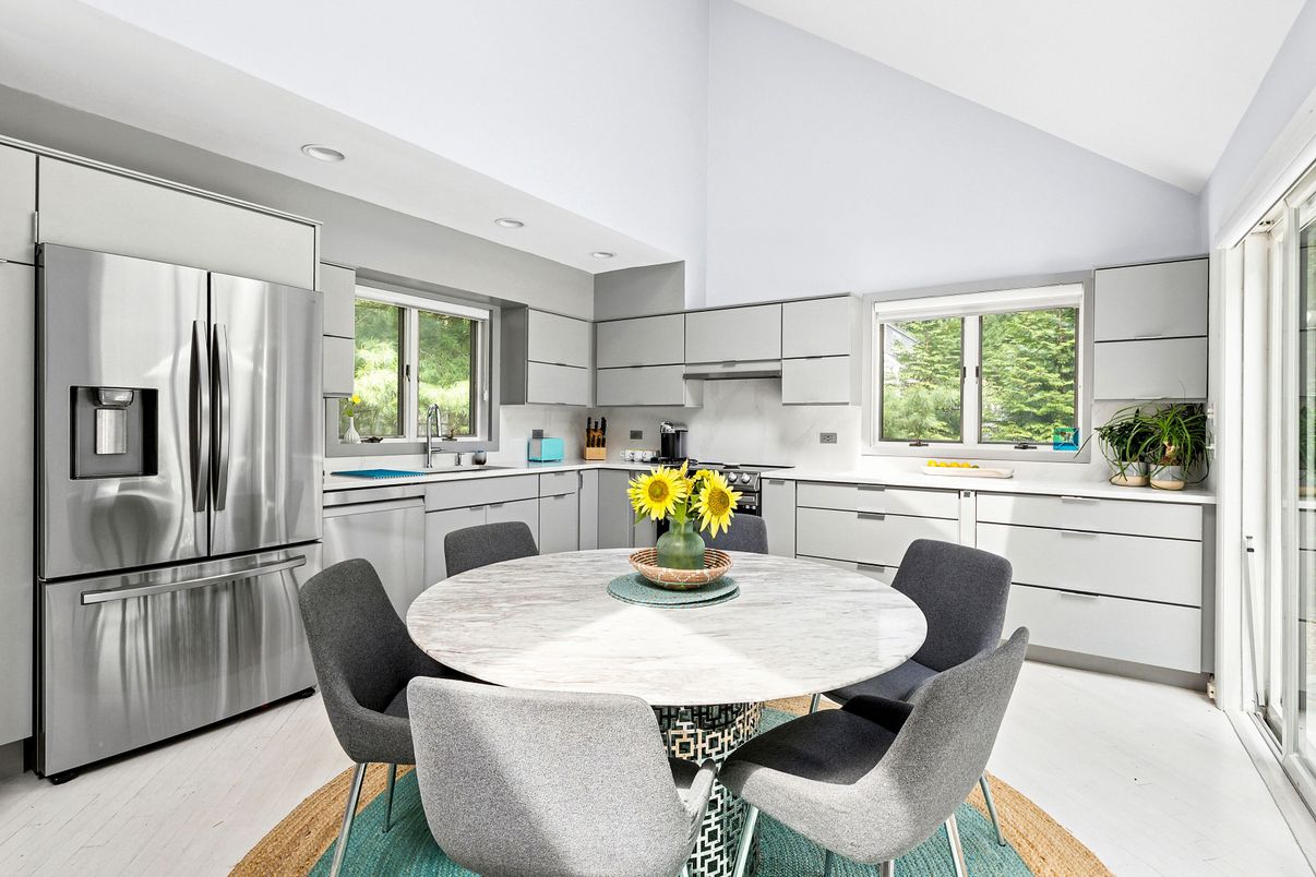 Dining room, Interior, Kitchen, Recessed Lighting, Stainless Steel Appliances, Wood Texture Flooring