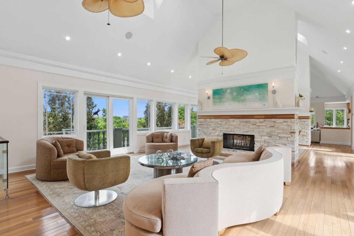 Fireplace, Interior, Living room, Recessed Lighting, Stone Walls, Wood Texture Flooring