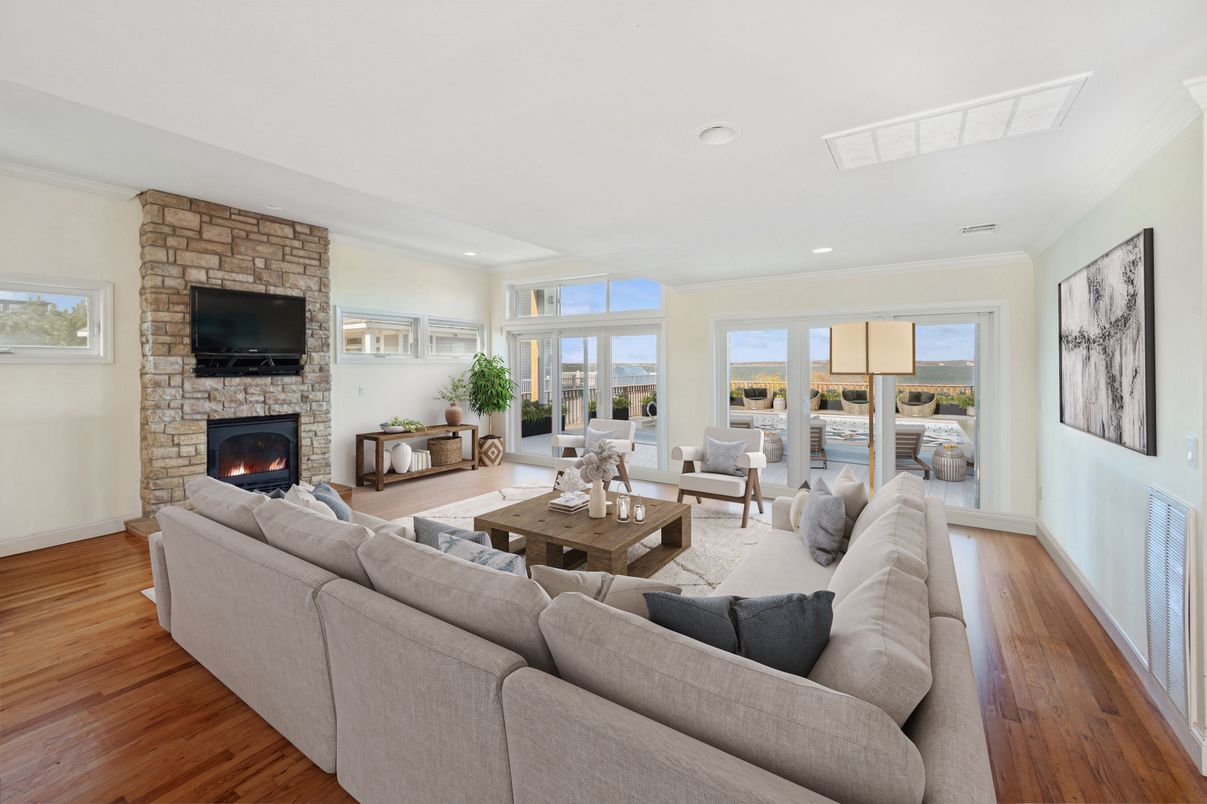 Fireplace, Interior, Living room, Recessed Lighting, Stone Walls, Wood Texture Flooring