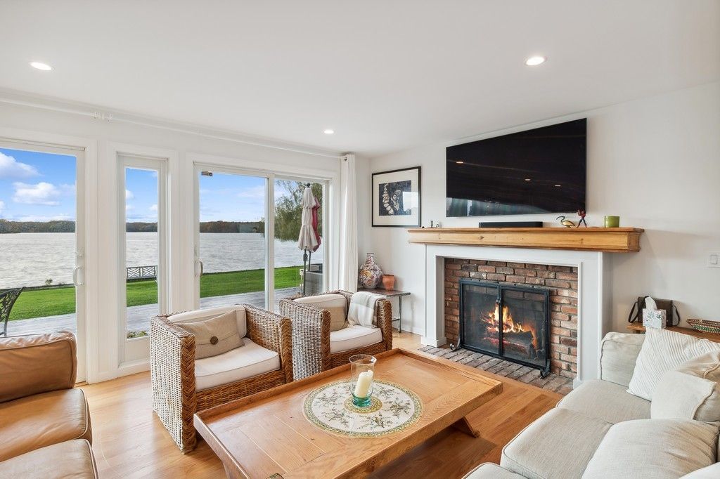 Fireplace, Interior, Living room, Recessed Lighting, Water, Wood Texture Flooring