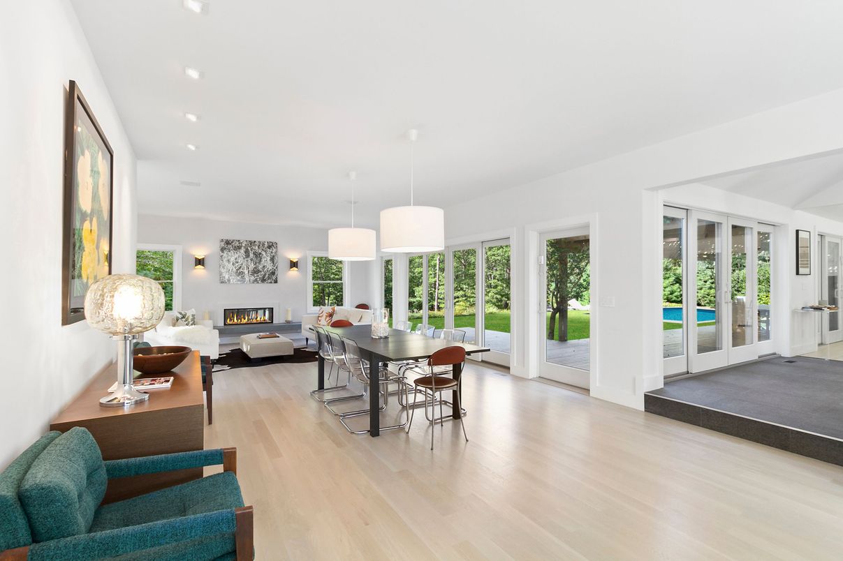 Dining room, Fireplace, Interior, Living room, Pendant Lights, Recessed Lighting, Wood Texture Flooring