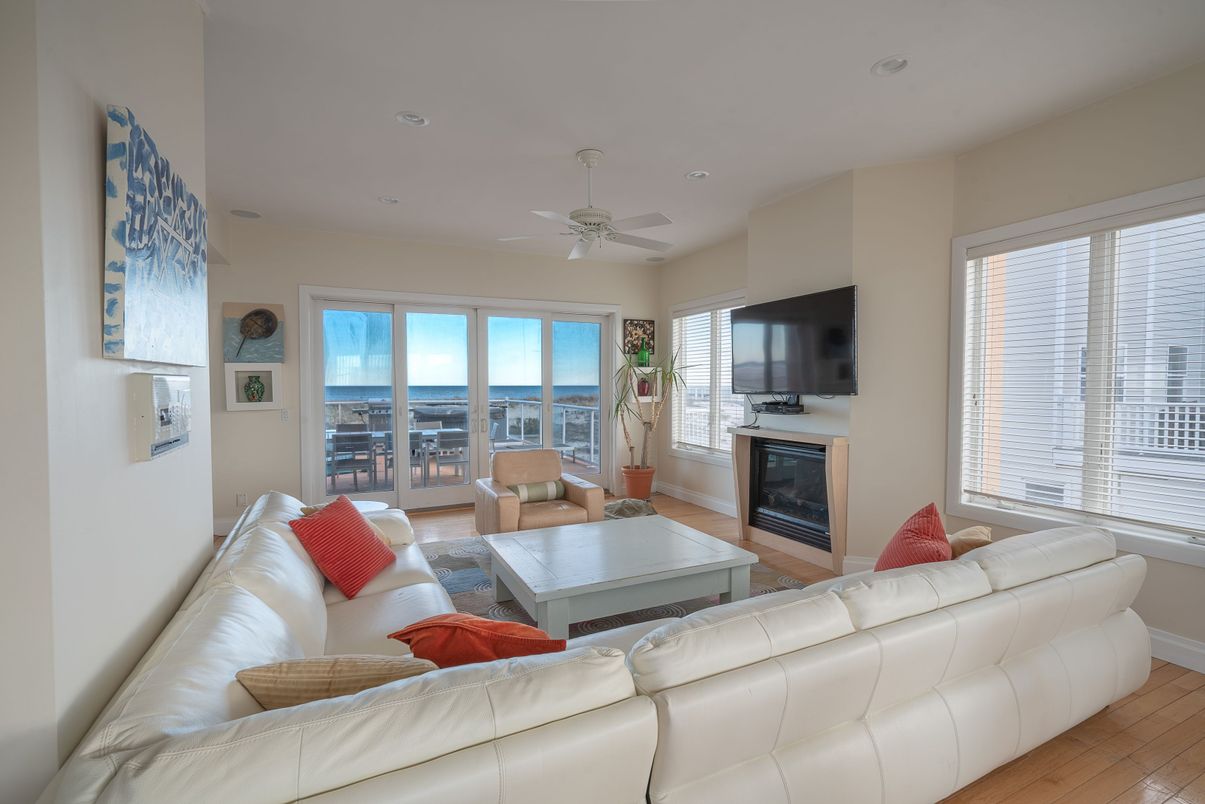 Fireplace, Interior, Living room, Recessed Lighting, Water, Wood Texture Flooring