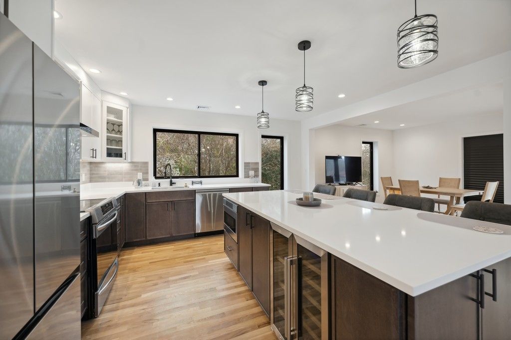 Dining room, Interior, Kitchen, Pendant Lights, Recessed Lighting, Stainless Steel Appliances, Wood Texture Flooring