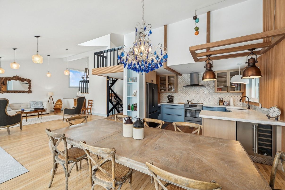 Chandelier, Dining room, Interior, Kitchen, Pendant Lights, Stainless Steel Appliances, Stone Walls, Wood Texture Flooring