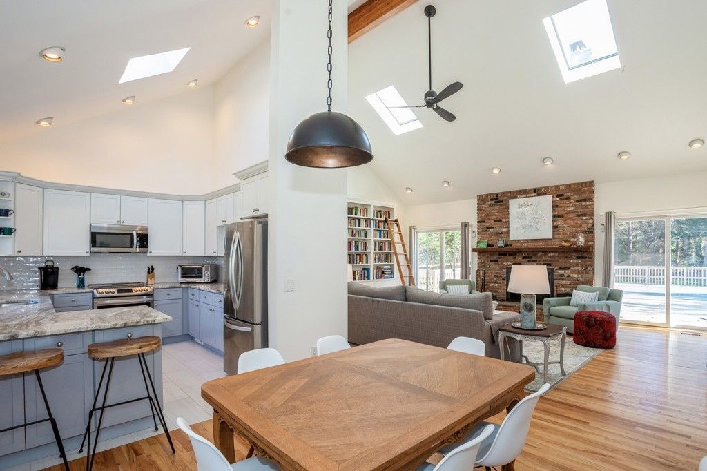 Dining room, Fireplace, Interior, Kitchen, Living room, Pendant Lights, Recessed Lighting, Stainless Steel Appliances, Stone Walls, Wood Texture Flooring