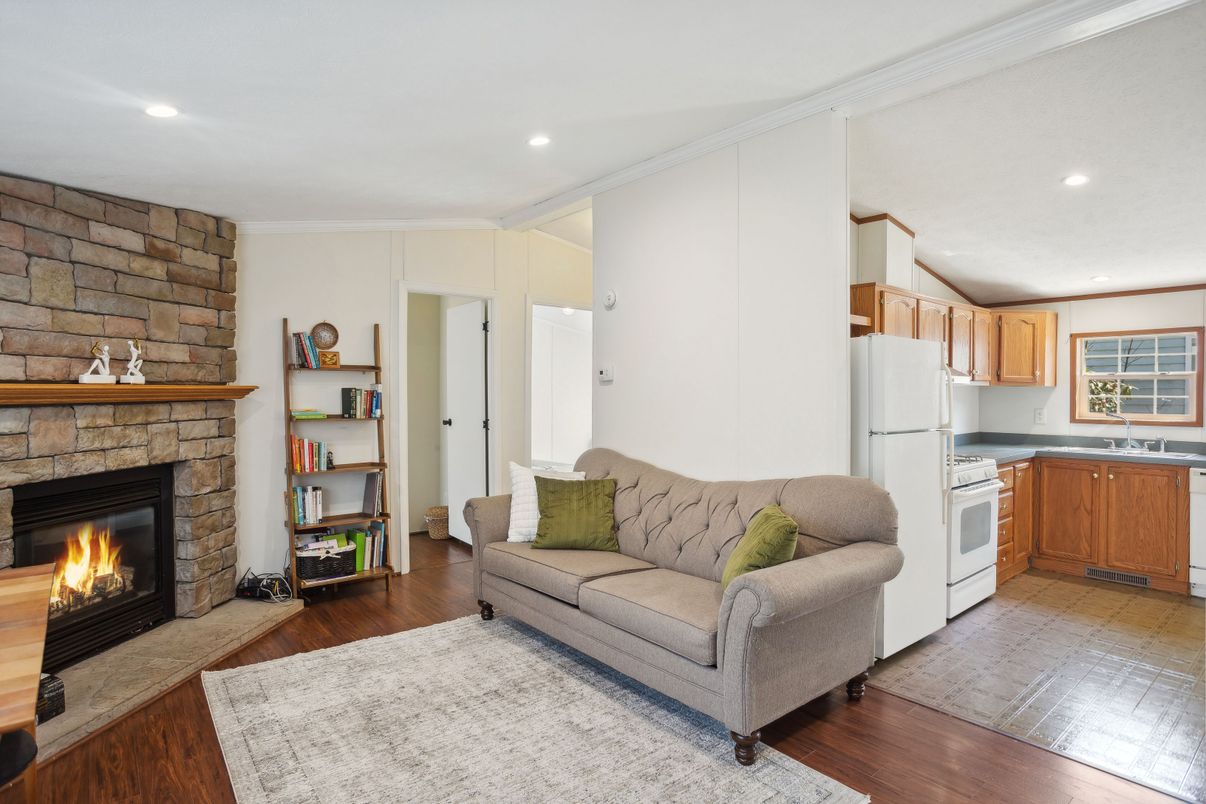 Fireplace, Interior, Kitchen, Recessed Lighting, Stone Walls, Wood Texture Flooring