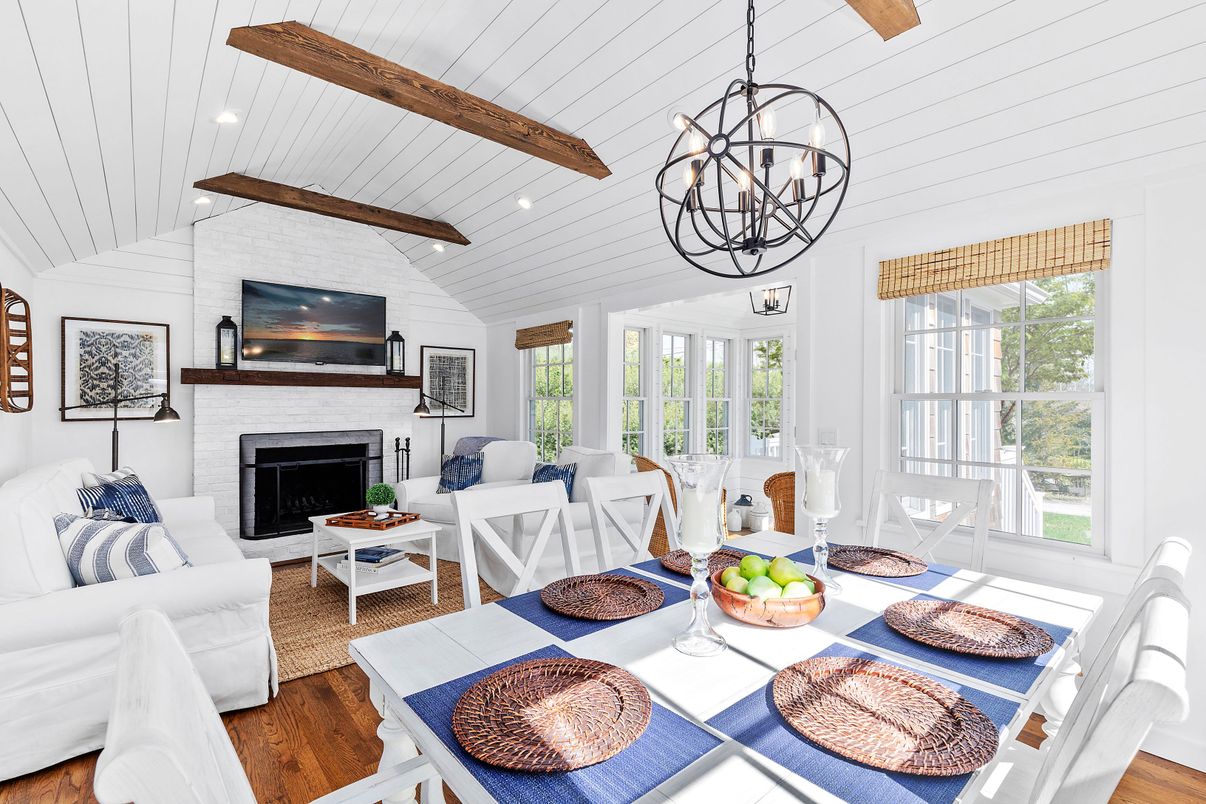 Chandelier, Dining room, Fireplace, Interior, Living room, Pendant Lights, Recessed Lighting, Wooden Beams, Wood Texture Flooring