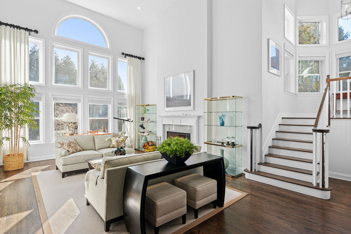 Dining room, Fireplace, Interior, Living room, Recessed Lighting, Wood Texture Flooring