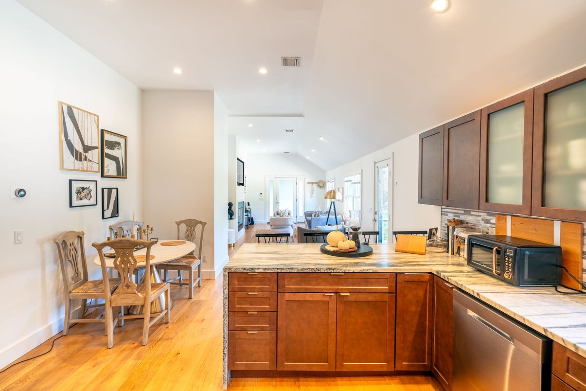 Dining room, Fireplace, Interior, Kitchen, Recessed Lighting, Wood Texture Flooring