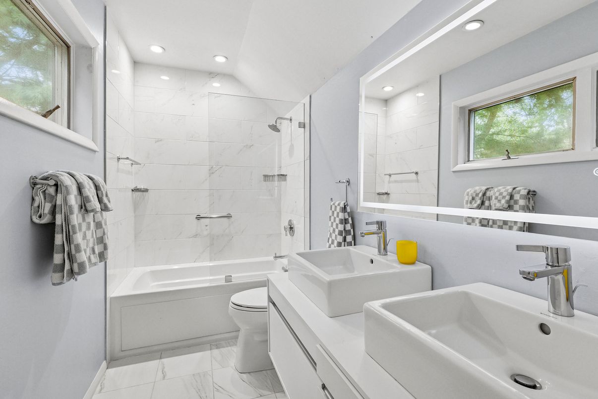 Bathroom, Dual Sink Vanities, Glass Shower, Interior, Marble, Marble Walls, Recessed Lighting