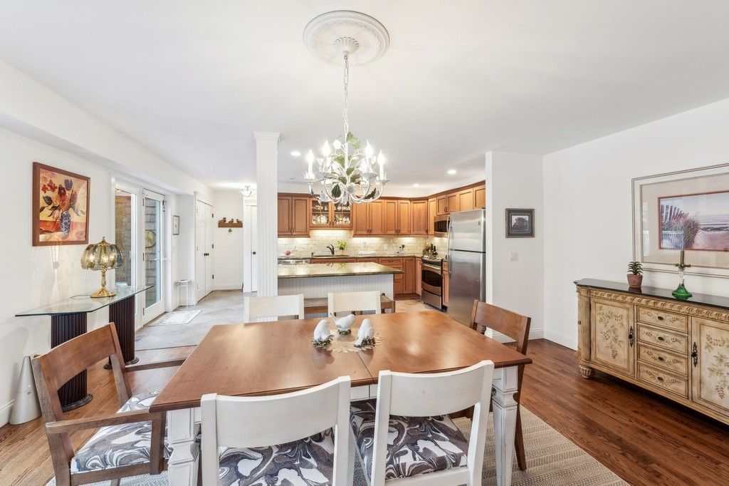 Chandelier, Dining room, Interior, Kitchen, Recessed Lighting, Stainless Steel Appliances, Wood Texture Flooring