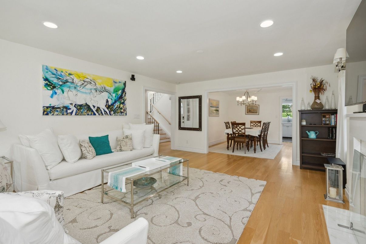 Chandelier, Dining room, Fireplace, Interior, Living room, Recessed Lighting, Wood Texture Flooring