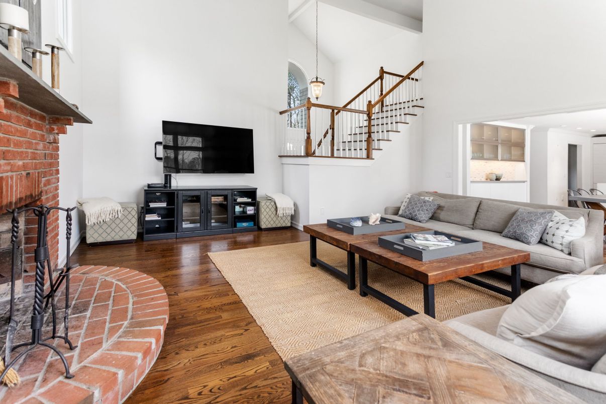Fireplace, Interior, Living room, Pendant Lights, Recessed Lighting, Stone Walls, Wood Texture Flooring