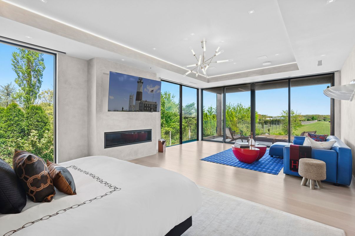 Bedroom, Fireplace, Interior, Pendant Lights, Recessed Lighting, Wood Texture Flooring