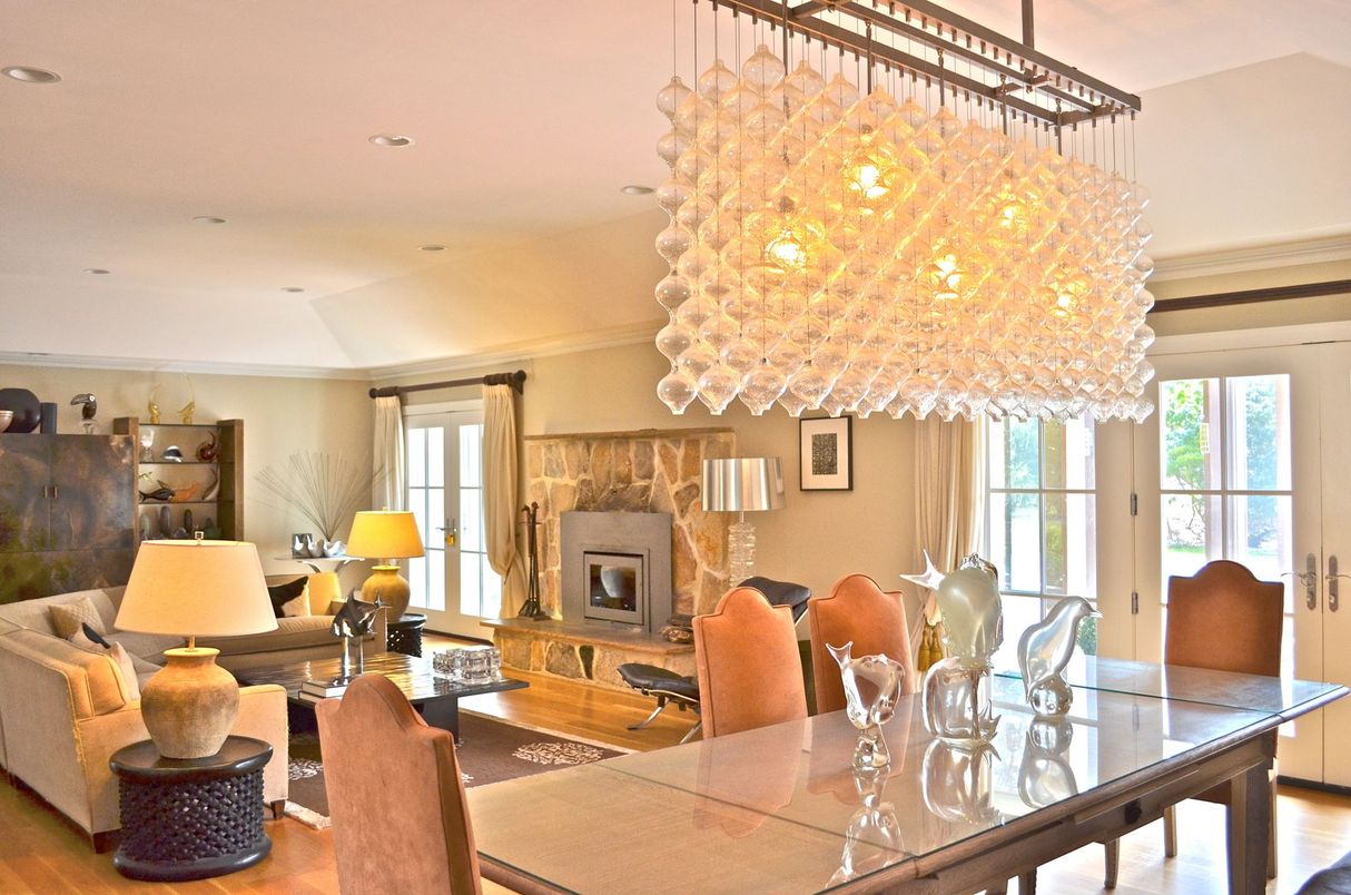 Chandelier, Dining room, Fireplace, Interior, Living room, Pendant Lights, Recessed Lighting, Wood Texture Flooring