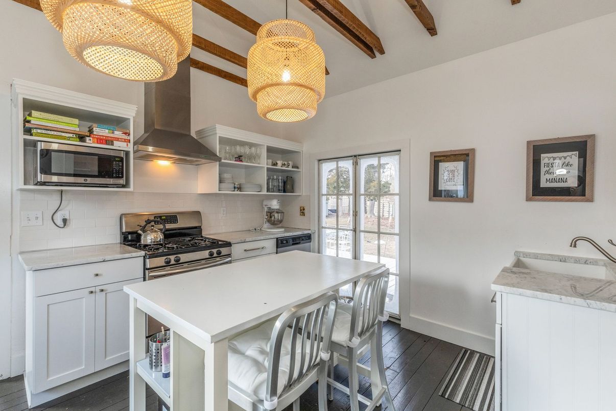 Chandelier, Interior, Kitchen, Pendant Lights, Stainless Steel Appliances, Wooden Beams, Wood Texture Flooring