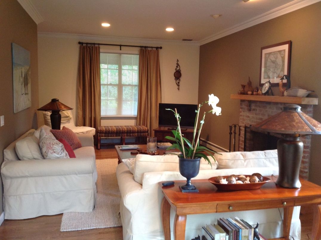 Fireplace, Interior, Living room, Recessed Lighting, Stone Walls, Wood Texture Flooring