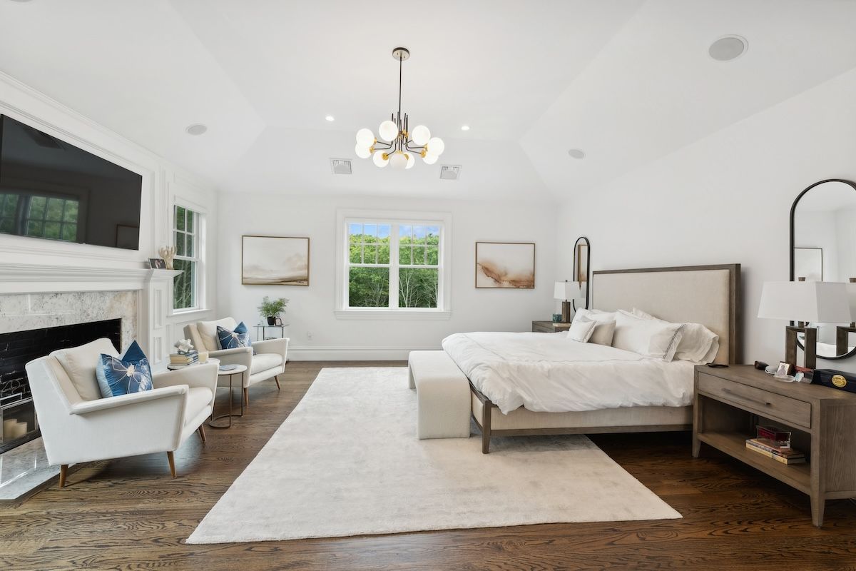 Bedroom, Chandelier, Fireplace, Interior, Recessed Lighting, Wood Texture Flooring