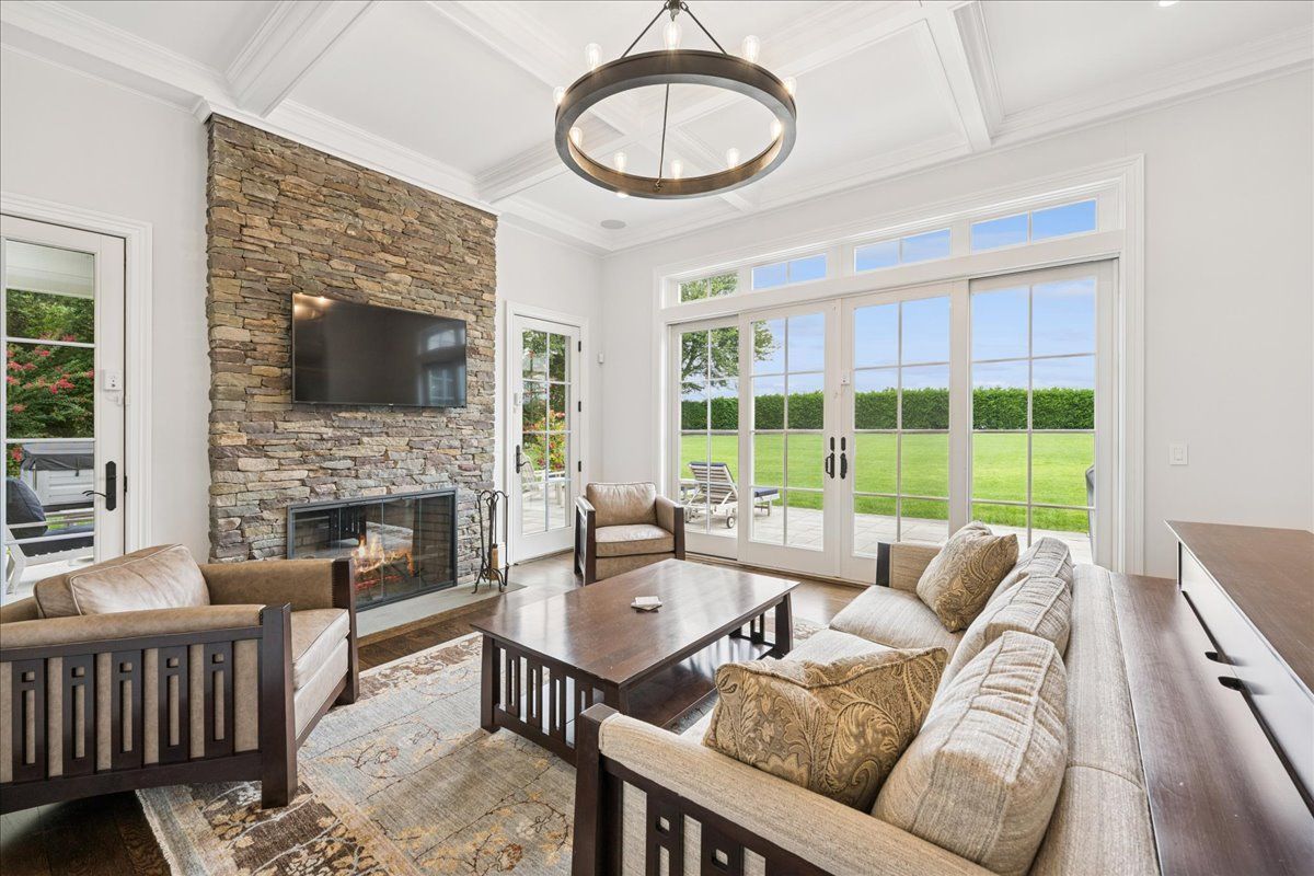 Fireplace, Interior, Living room, Pendant Lights, Stone Walls, Wood Texture Flooring