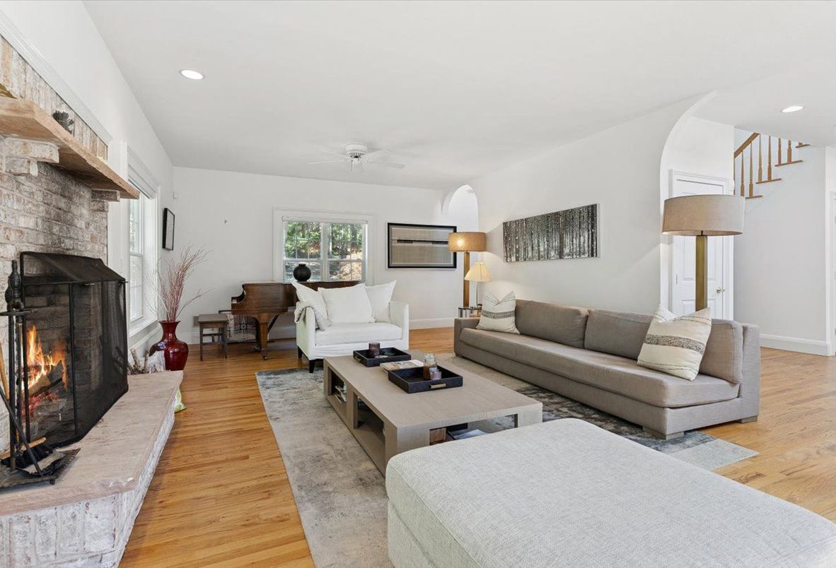 Fireplace, Interior, Living room, Piano, Recessed Lighting, Stone Walls, Wood Texture Flooring