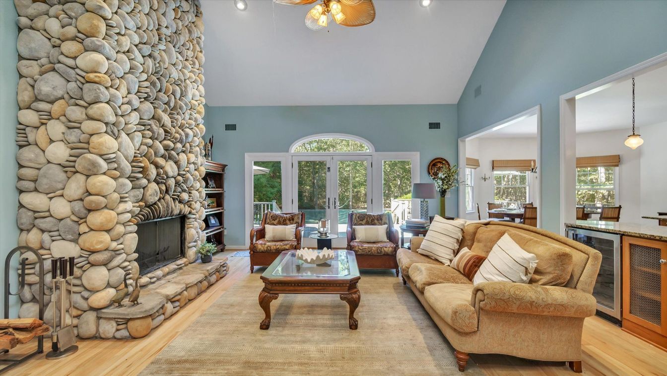 Fireplace, Interior, Living room, Pendant Lights, Recessed Lighting, Stone Walls, Wood Texture Flooring