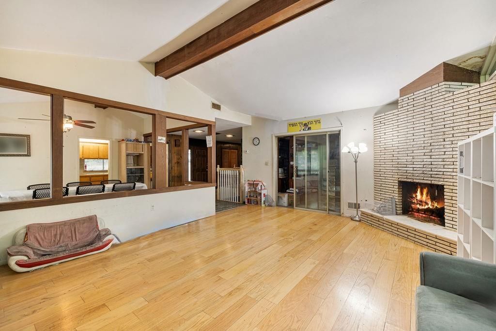 Fireplace, Interior, Living room, Stone Walls, Wooden Beams, Wood Texture Flooring