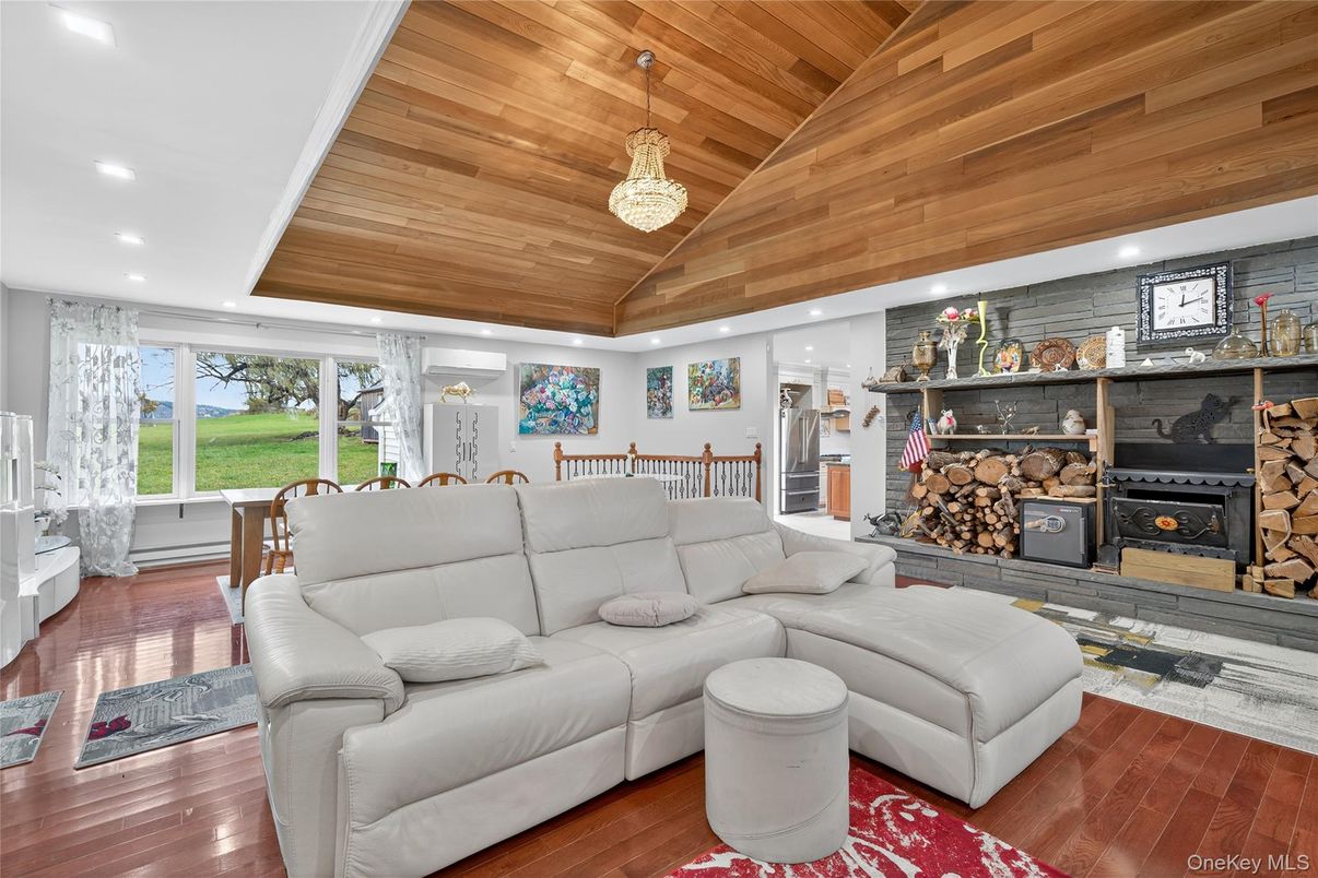 Fireplace, Interior, Living room, Pendant Lights, Recessed Lighting, Stone Walls, Wooden Ceilings, Wood Texture Flooring