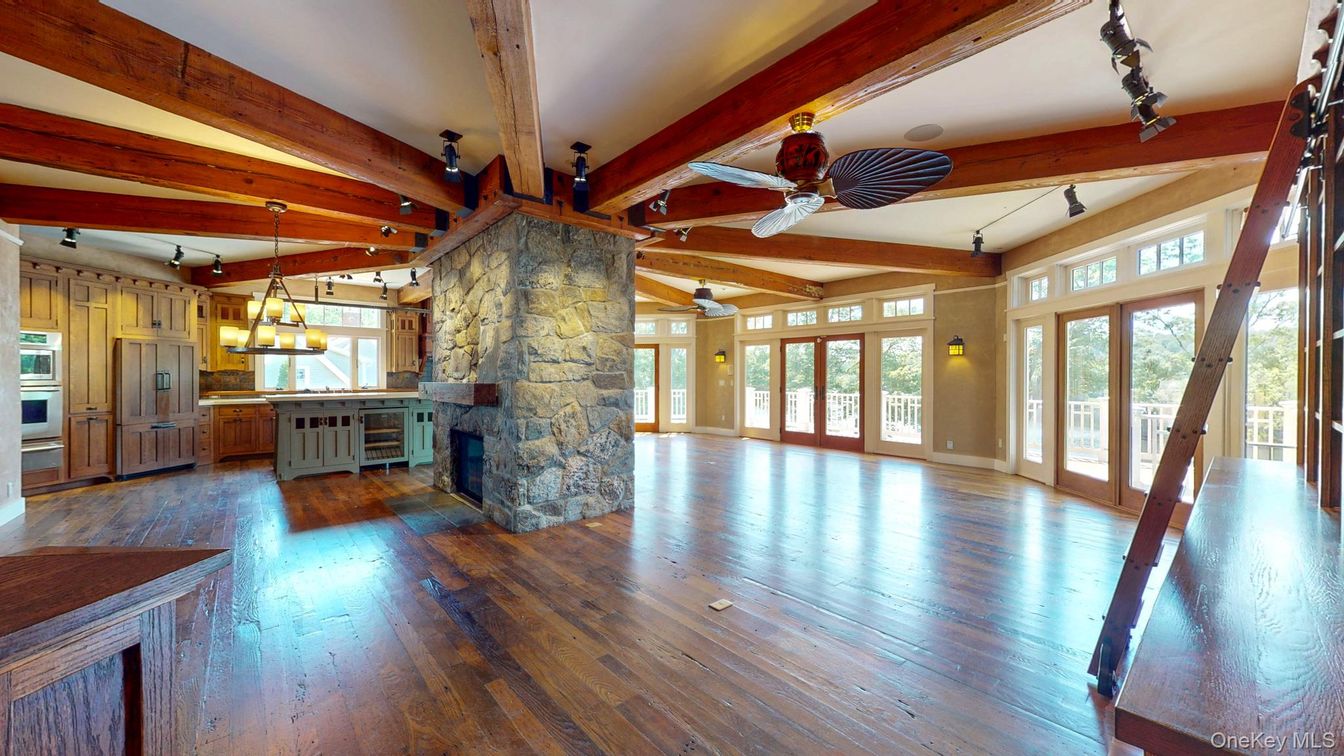 Empty room, Fireplace, Interior, Kitchen, Pendant Lights, Stone Walls, Wooden Beams, Wood Texture Flooring