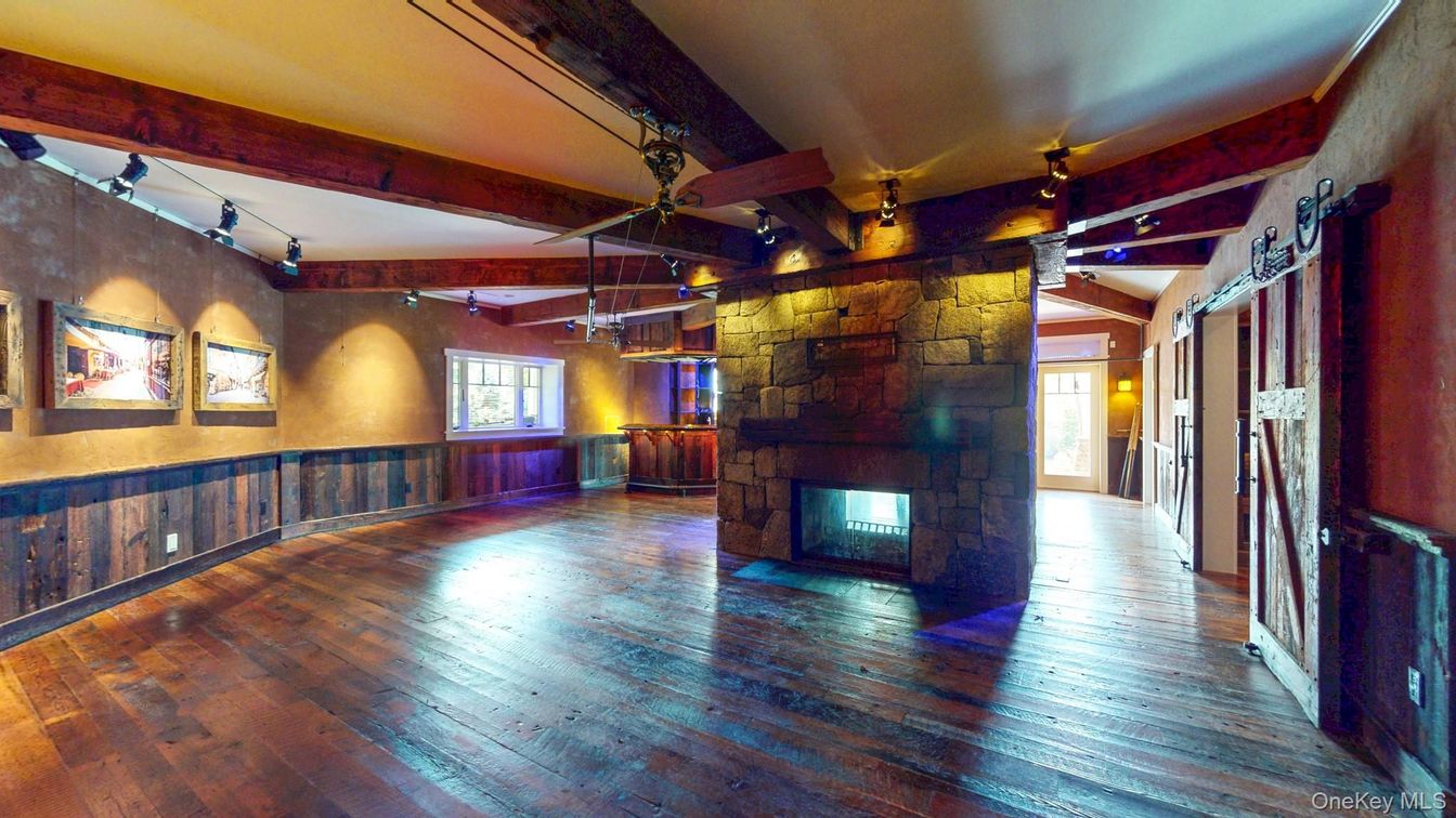 Empty room, Fireplace, Interior, Stone Walls, Wooden Beams, Wood Texture Flooring