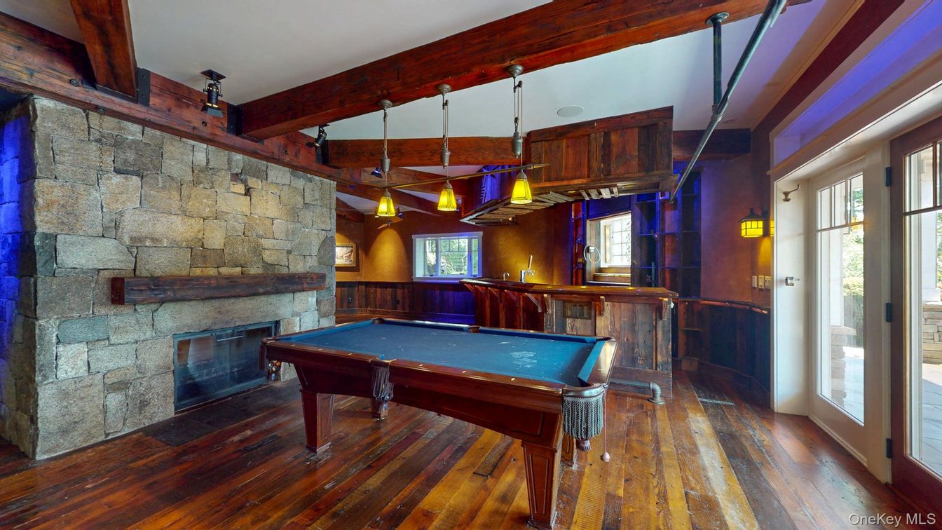 Billiard Table, Fireplace, Game Room, Interior, Pendant Lights, Stone Walls, Wooden Beams, Wood Texture Flooring