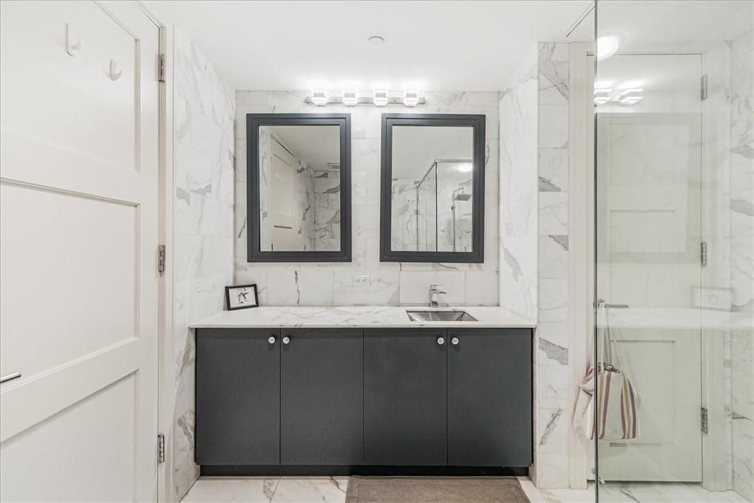 Bathroom, Dual Sink Vanities, Glass Shower, Interior, Marble, Marble Walls