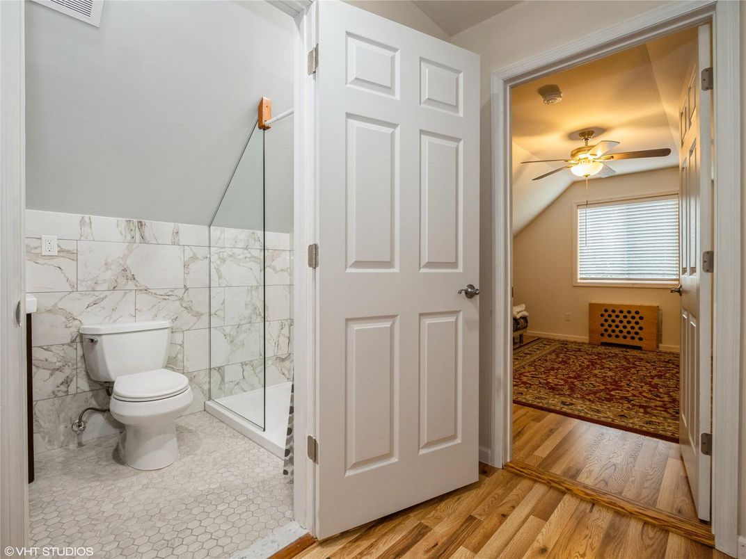 Bathroom, Glass Shower, Interior, Marble Walls, Wood Texture Flooring