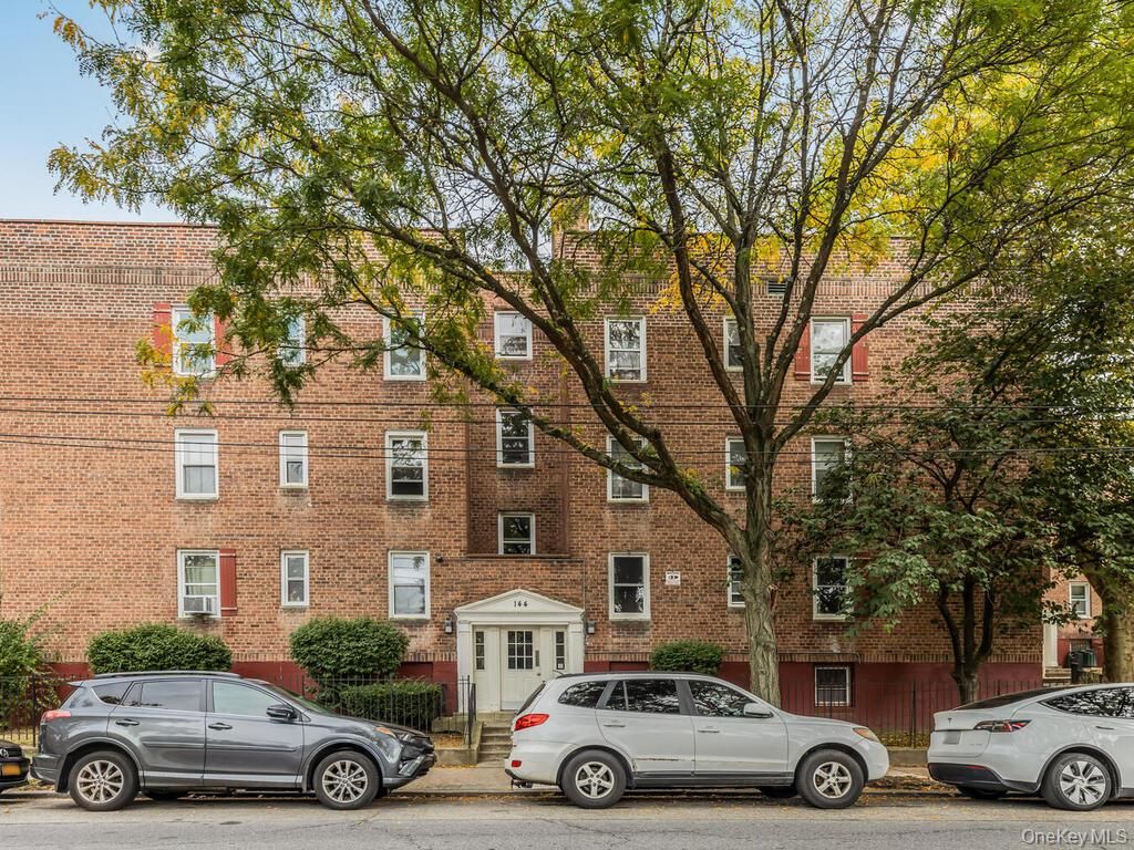Exterior, Facade, Brick Facade, Condo Building