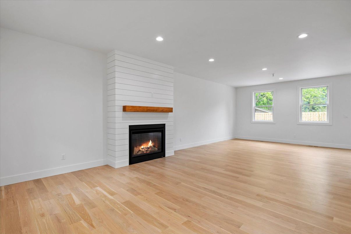 Empty room, Fireplace, Interior, Recessed Lighting, Wood Texture Flooring