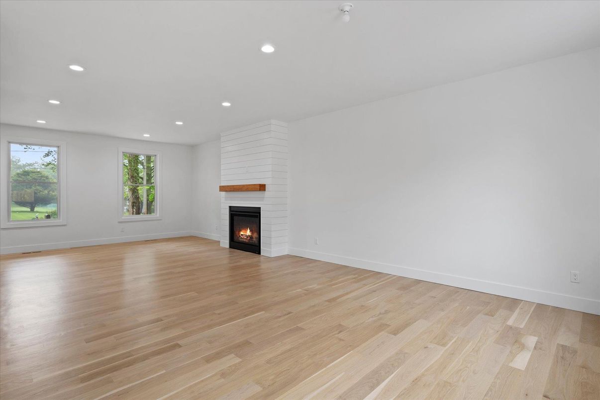 Empty room, Fireplace, Interior, Recessed Lighting, Wood Texture Flooring