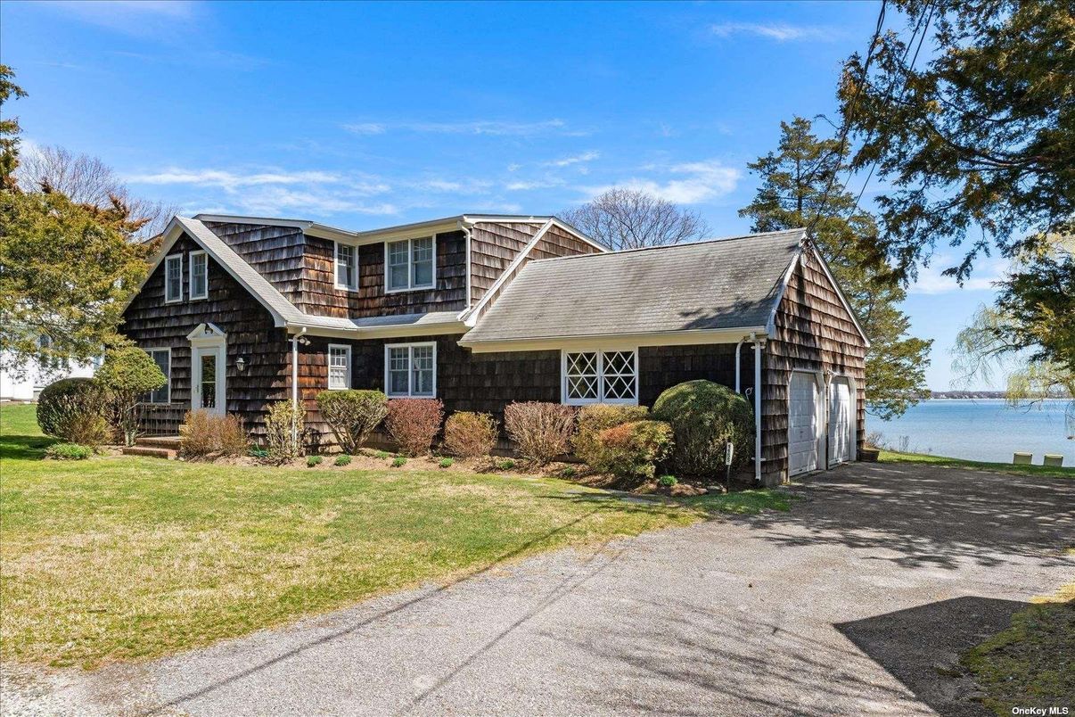 Attached, Backyard, Exterior, Facade, Water, Tudor Revival