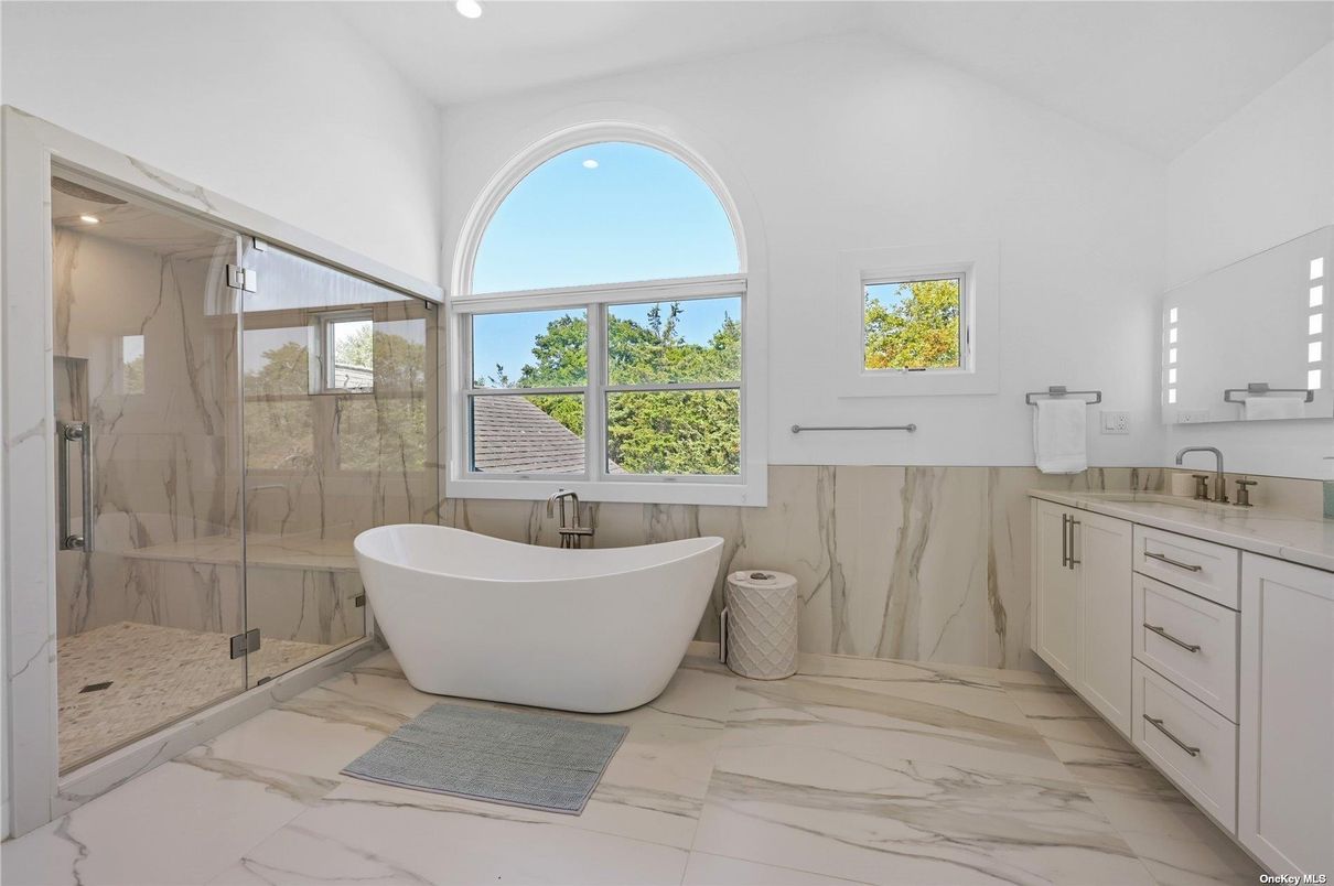 Bathroom, Free Standing Baths, Glass Shower, Interior, Marble, Marble Walls, Recessed Lighting