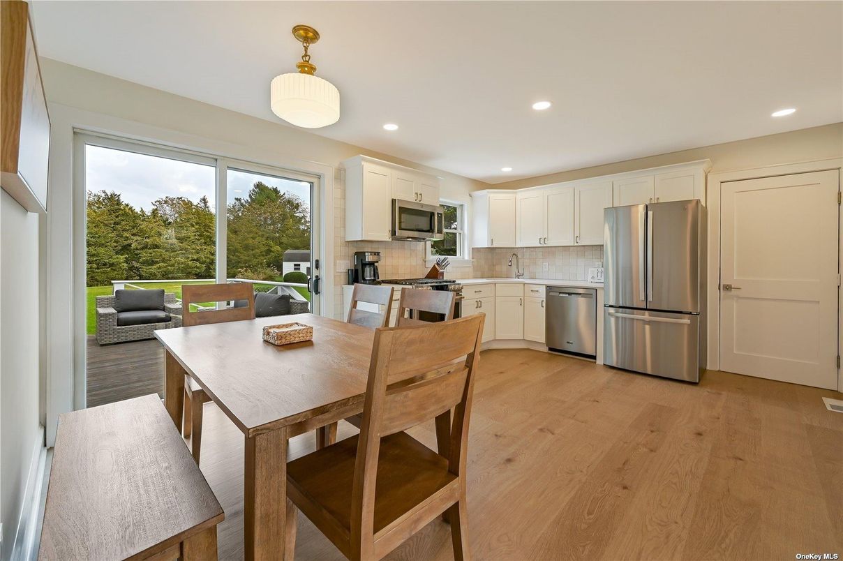 Dining room, Interior, Kitchen, Pendant Lights, Recessed Lighting, Stainless Steel Appliances, Wood Texture Flooring