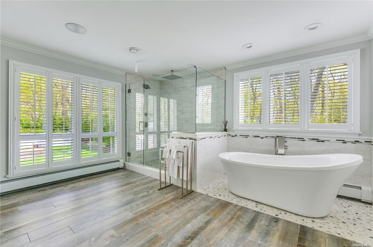 Bathroom, Free Standing Baths, Glass Shower, Interior, Recessed Lighting, Wood Texture Flooring