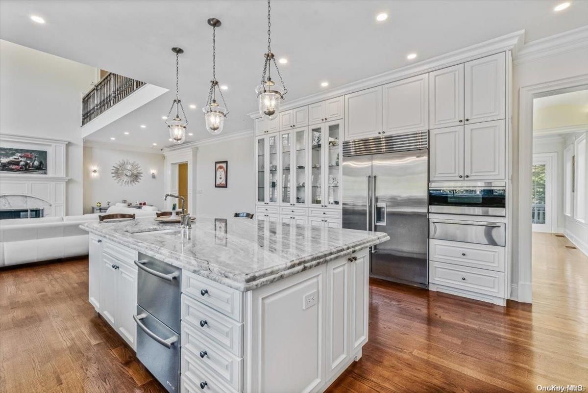 Fireplace, Interior, Kitchen, Pendant Lights, Recessed Lighting, Stainless Steel Appliances, Wood Texture Flooring