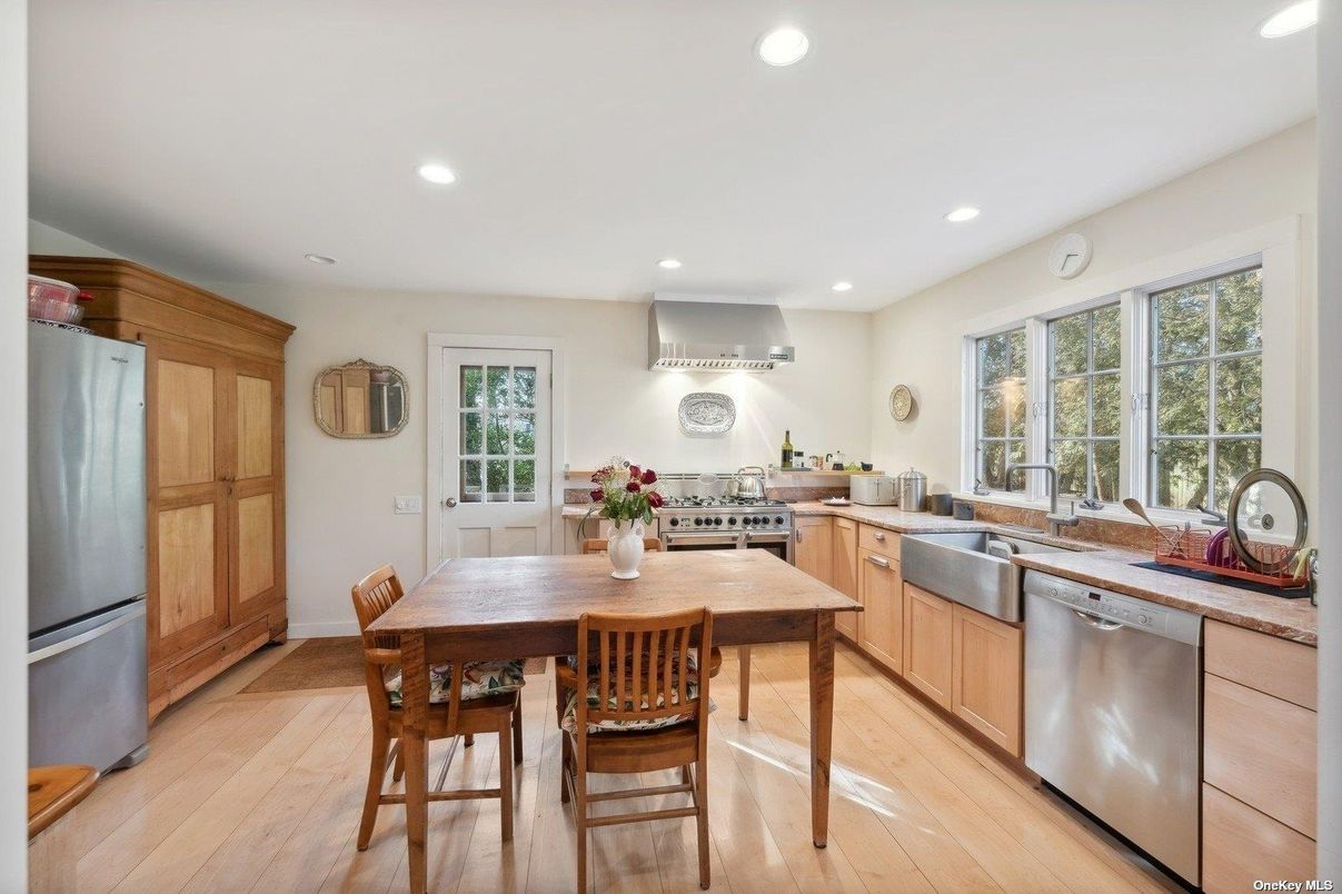 Dining room, Interior, Kitchen, Recessed Lighting, Stainless Steel Appliances, Wood Texture Flooring