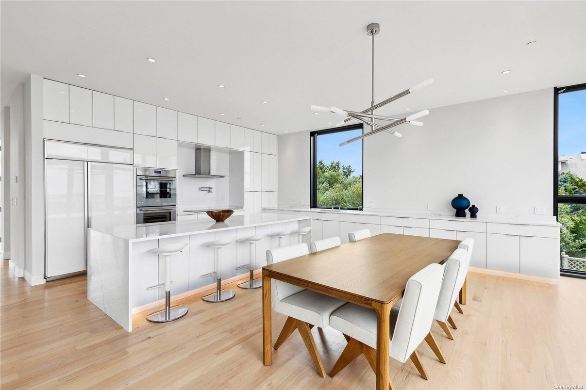 Dining room, Interior, Kitchen, Pendant Lights, Recessed Lighting, Stainless Steel Appliances, Wood Texture Flooring