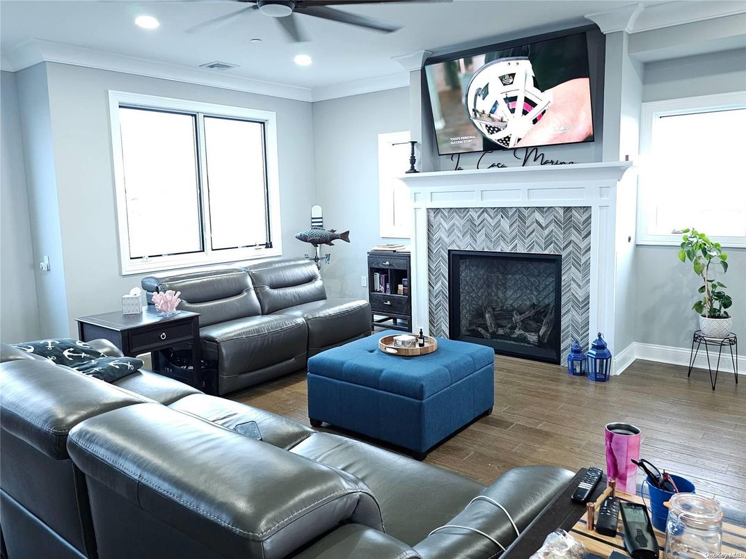 Fireplace, Interior, Living room, Recessed Lighting, Wood Texture Flooring
