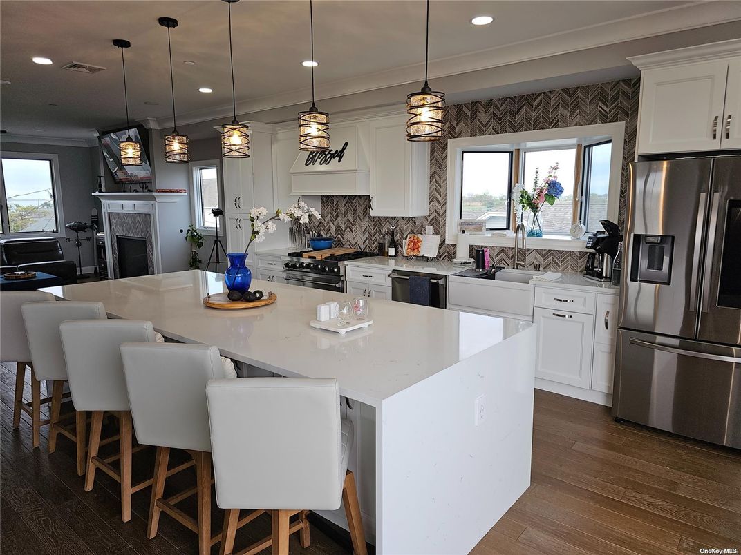 Fireplace, Interior, Kitchen, Pendant Lights, Recessed Lighting, Stainless Steel Appliances, Wood Texture Flooring