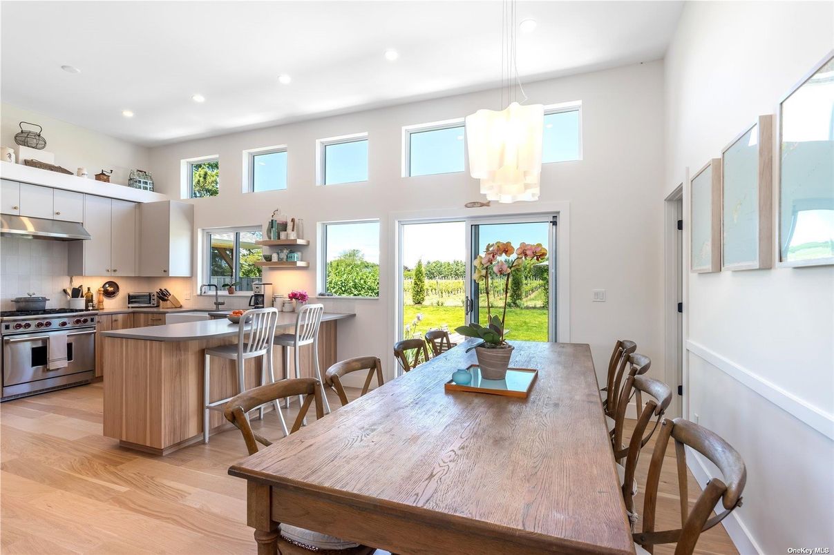 Dining room, Interior, Kitchen, Pendant Lights, Recessed Lighting, Stainless Steel Appliances, Wood Texture Flooring