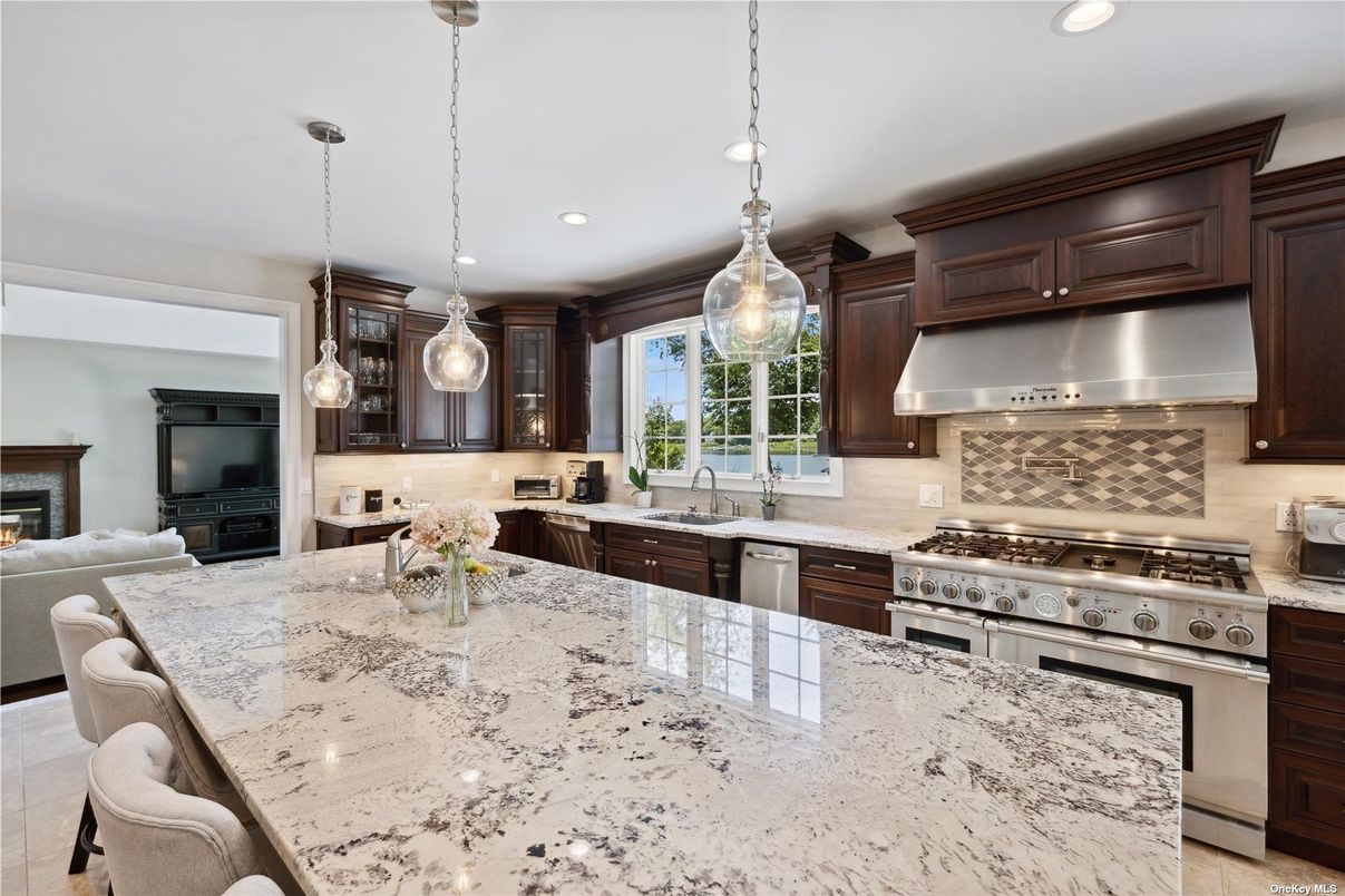 Fireplace, Interior, Kitchen, Pendant Lights, Recessed Lighting, Stainless Steel Appliances